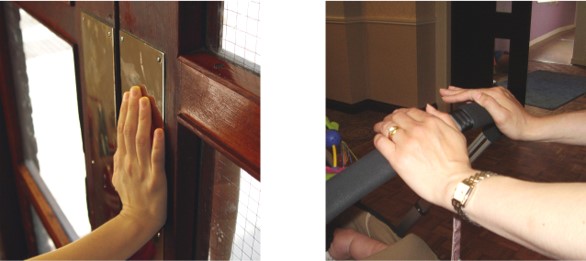 a flat door requires the wrist to bend significantly to push it, whereas a pram allows for a more neutral wrist position