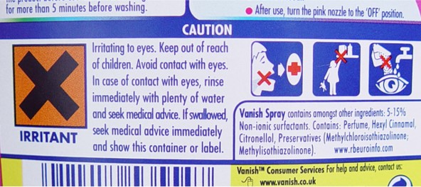 photo of a product label that has a mixture of icons, symbols, bullet points, paragraphs of text and breakout boxes